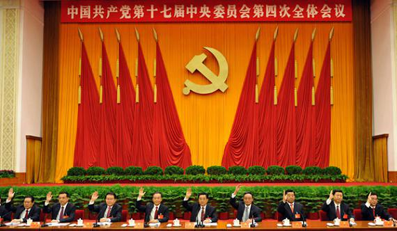 這是胡錦濤、吳邦國、溫家寶、賈慶林、李長春、習(xí)近平、李克強、賀國強、周永康在主席臺上。新華社記者黃敬文攝